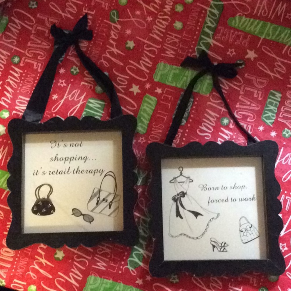 2 black scallop framed pictures. With ribbon hangs